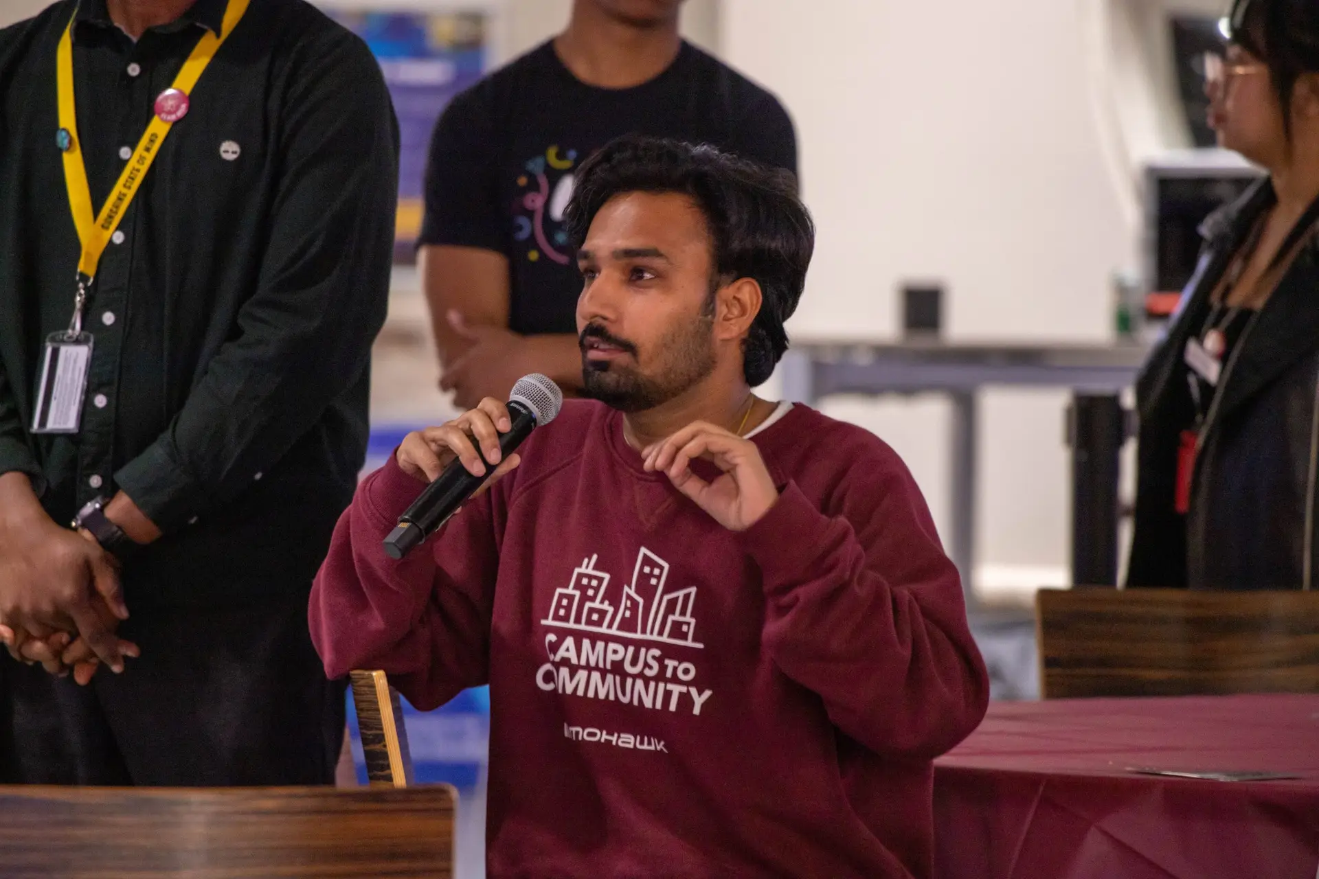 Student asking a question at The AMM (2024). 